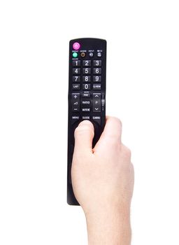 Hand with TV remote control isolated on white