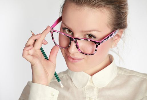 teacher in funny eyeglasses with pen