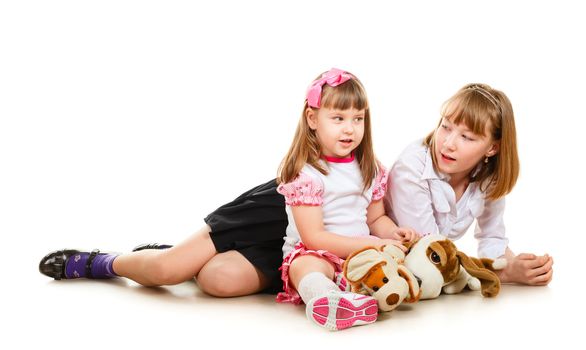 cute little sisters portrait, close up, isolated on white