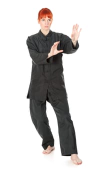 girl in black kimono exercise, isolated on white