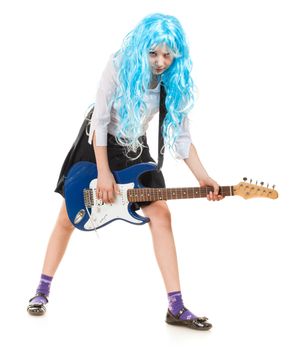 teen girl playing on a guitar, isolated on white