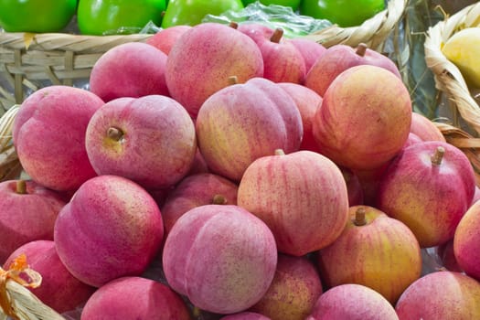 peach fruit in bamboo basket