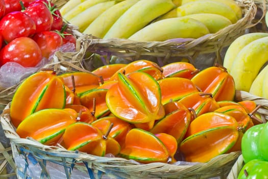 pile of star fruits in bamboo basket