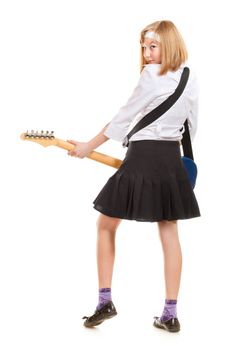 teen girl playing on a guitar, isolated on white