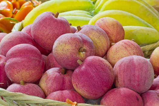 peach fruit in bamboo basket