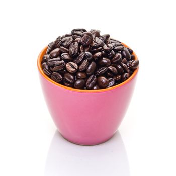 coffee beans in pink cup