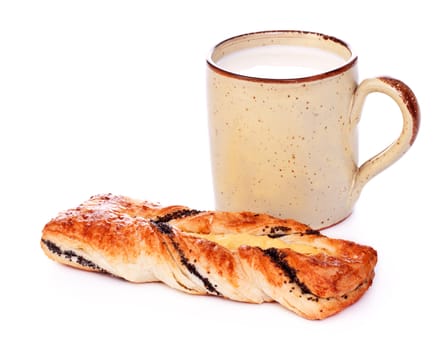 poppy pie and mug of milk isolated on white