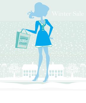 fashion winter girl with shopping bags - winter sale