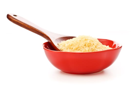 red bowl with rice and wooden spoon