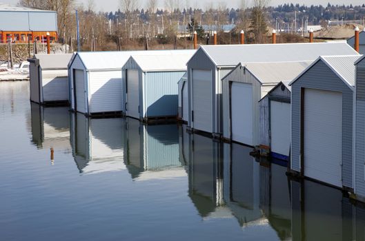 Boat garages with flood control steel beams, Portland OR.
