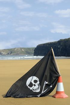 sandy golden beach with jolly roger flag in ballybunion county Kerry Ireland