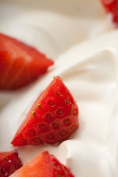 Dessert from fruit and cream macro with soft light