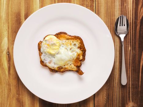 close up of a plate of burnt breakfast