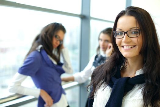 Student meeting smiley girl face on foreground 