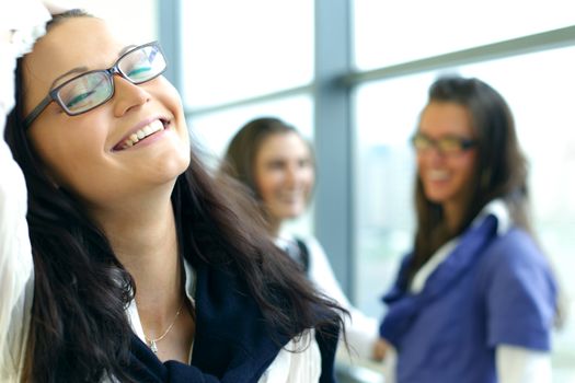 Student meeting smiley girl face on foreground 