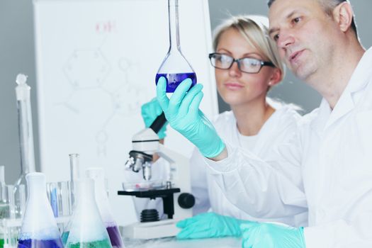 Chemistry Scientist conducting experiments in laboratory