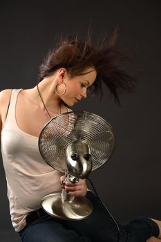 girl with fan studio portrait