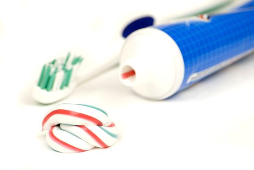 white red and blue squeezed toothpaste isolated on a white background