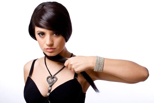Beautiful fashiom model portrait dark hair with jewelry 