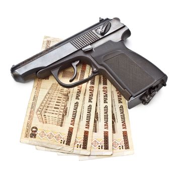 gun and money isolated on white background