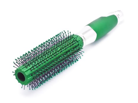 green hair brush isolated on white background