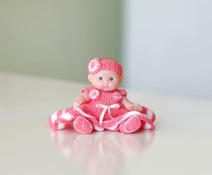 small doll on the table