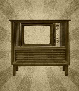 Vintage television on grunge paper  with abstract sun rays