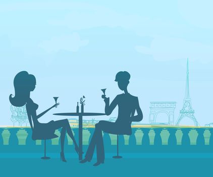 Young couple flirt and drink champagne in Paris