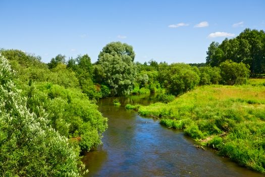 spring landscape with calm river at sunny day