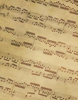 music notes by Bach on old brown vintage paper