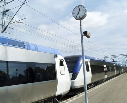 Train at the station towards blue sky