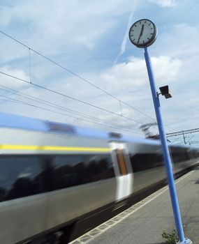 Train at the station towards blue sky