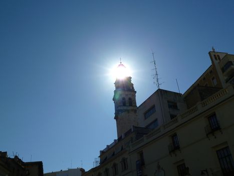 church tower against bright sunlight