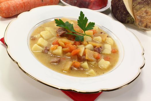 fresh cooked Turnip soup with beef, carrots, potatoes and parsley