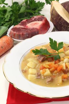 Turnip soup with beef, carrots, potatoes and fresh parsley