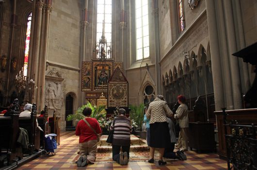 ZAGREB, CROATIA - APRIL 10: On Good Friday, people pray in front of God's tomb in the Zagreb Cathedral, April 10, 2009 in Zagreb, Croatia.