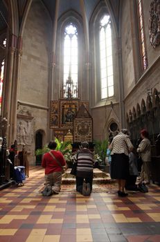 ZAGREB, CROATIA - APRIL 10: On Good Friday, people pray in front of God's tomb in the Zagreb Cathedral, April 10, 2009 in Zagreb, Croatia.