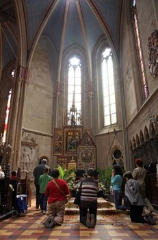 ZAGREB, CROATIA - APRIL 10: On Good Friday, people pray in front of God's tomb in the Zagreb Cathedral, April 10, 2009 in Zagreb, Croatia.