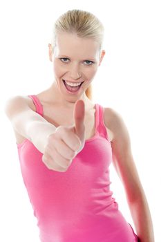 Attractive girl showing thumbs-up on white background