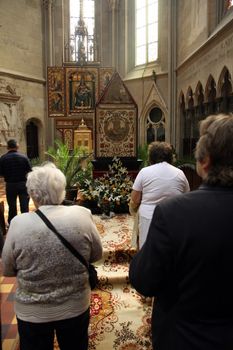 ZAGREB, CROATIA - APRIL 10: On Good Friday, people pray in front of God's tomb in the Zagreb Cathedral, April 10, 2009 in Zagreb, Croatia.