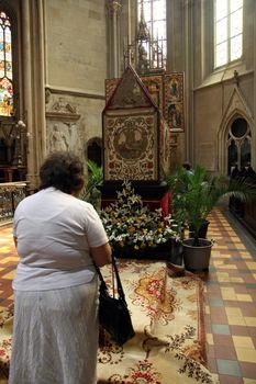 ZAGREB, CROATIA - APRIL 10: On Good Friday, people pray in front of God's tomb in the Zagreb Cathedral, April 10, 2009 in Zagreb, Croatia.