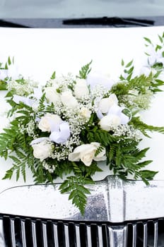 Bridal bouquet on the Car hood