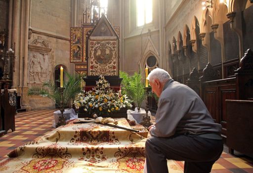 ZAGREB, CROATIA - APRIL 11: On Holy Saturday, people pray in front of God's tomb in the Zagreb Cathedral, April 11, 2009 in Zagreb, Croatia.