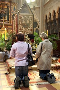 ZAGREB, CROATIA - APRIL 11: On Holy Saturday, people pray in front of God's tomb in the Zagreb Cathedral, April 11, 2009 in Zagreb, Croatia.