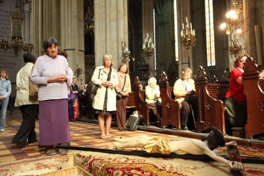 ZAGREB, CROATIA - APRIL 11: On Holy Saturday, people pray in front of God's tomb in the Zagreb Cathedral, April 11, 2009 in Zagreb, Croatia.