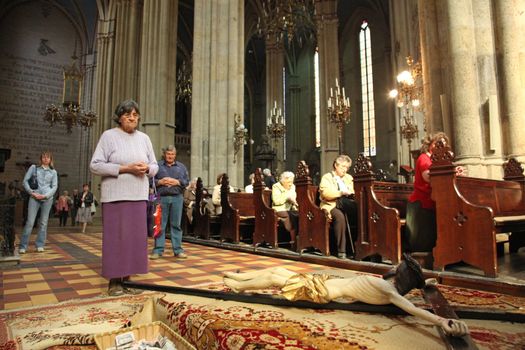 ZAGREB, CROATIA - APRIL 11: On Holy Saturday, people pray in front of God's tomb in the Zagreb Cathedral, April 11, 2009 in Zagreb, Croatia.