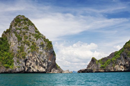 tall cliff with trees at Andaman Sea, Thailand