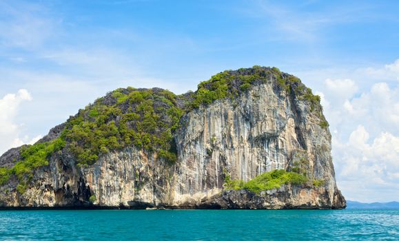 tall cliff with trees at Andaman Sea, Thailand