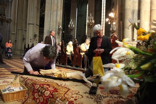 ZAGREB, CROATIA - APRIL 11: On Holy Saturday, people pray in front of God's tomb in the Zagreb Cathedral, April 11, 2009 in Zagreb, Croatia.