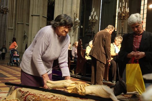ZAGREB, CROATIA - APRIL 11: On Holy Saturday, people pray in front of God's tomb in the Zagreb Cathedral, April 11, 2009 in Zagreb, Croatia.